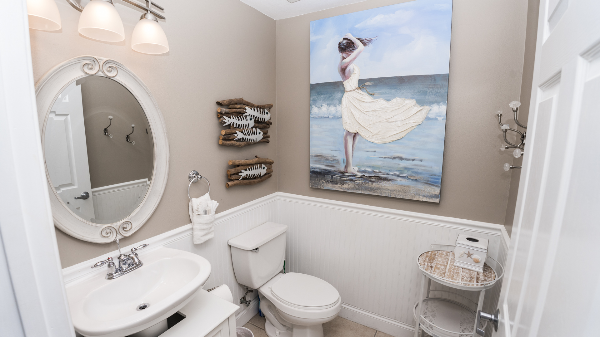 A Half Bath At Entrance