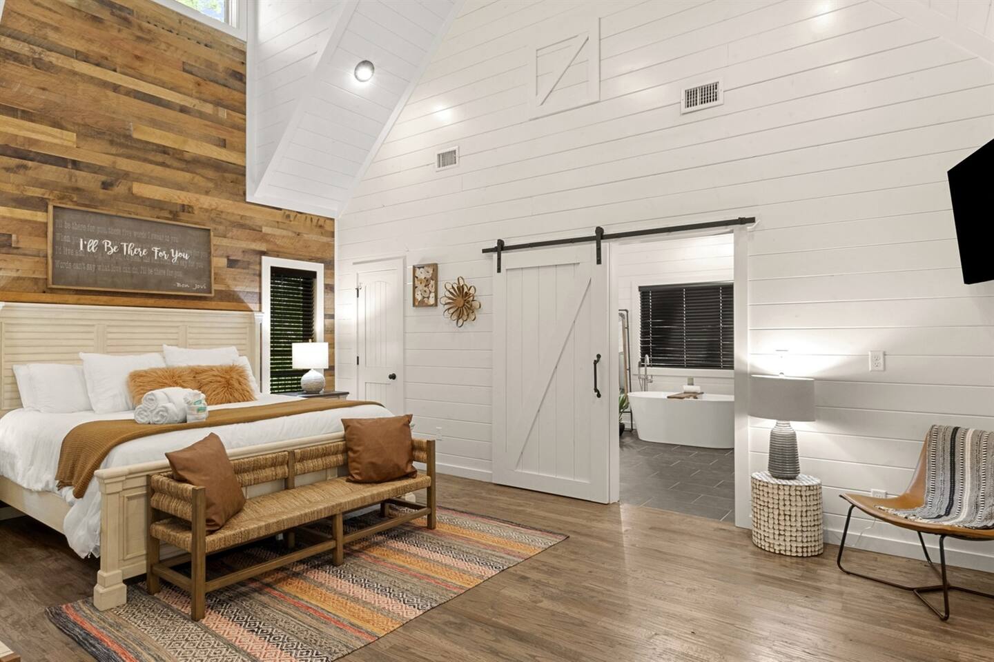 Drift into dreamland with plush bedding and tranquil décor that promises restful nights and cozy mornings.