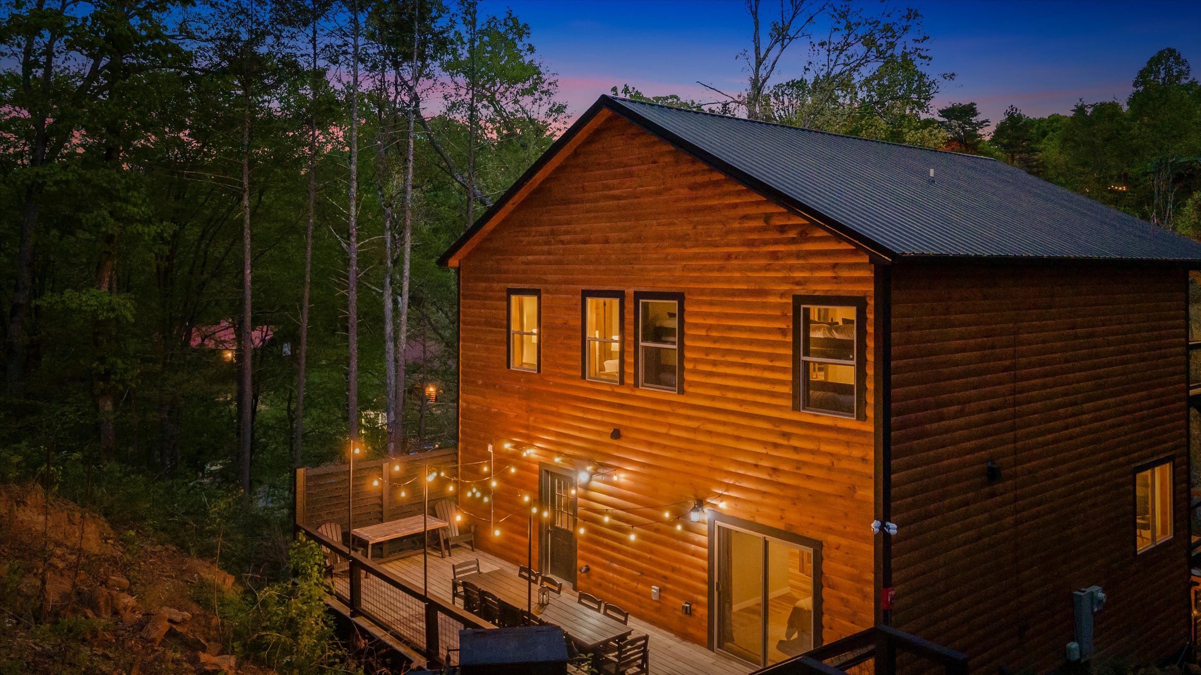 Twinkle lights and starlit skies—the perfect backdrop for a midnight dip or a glass of wine on the deck.