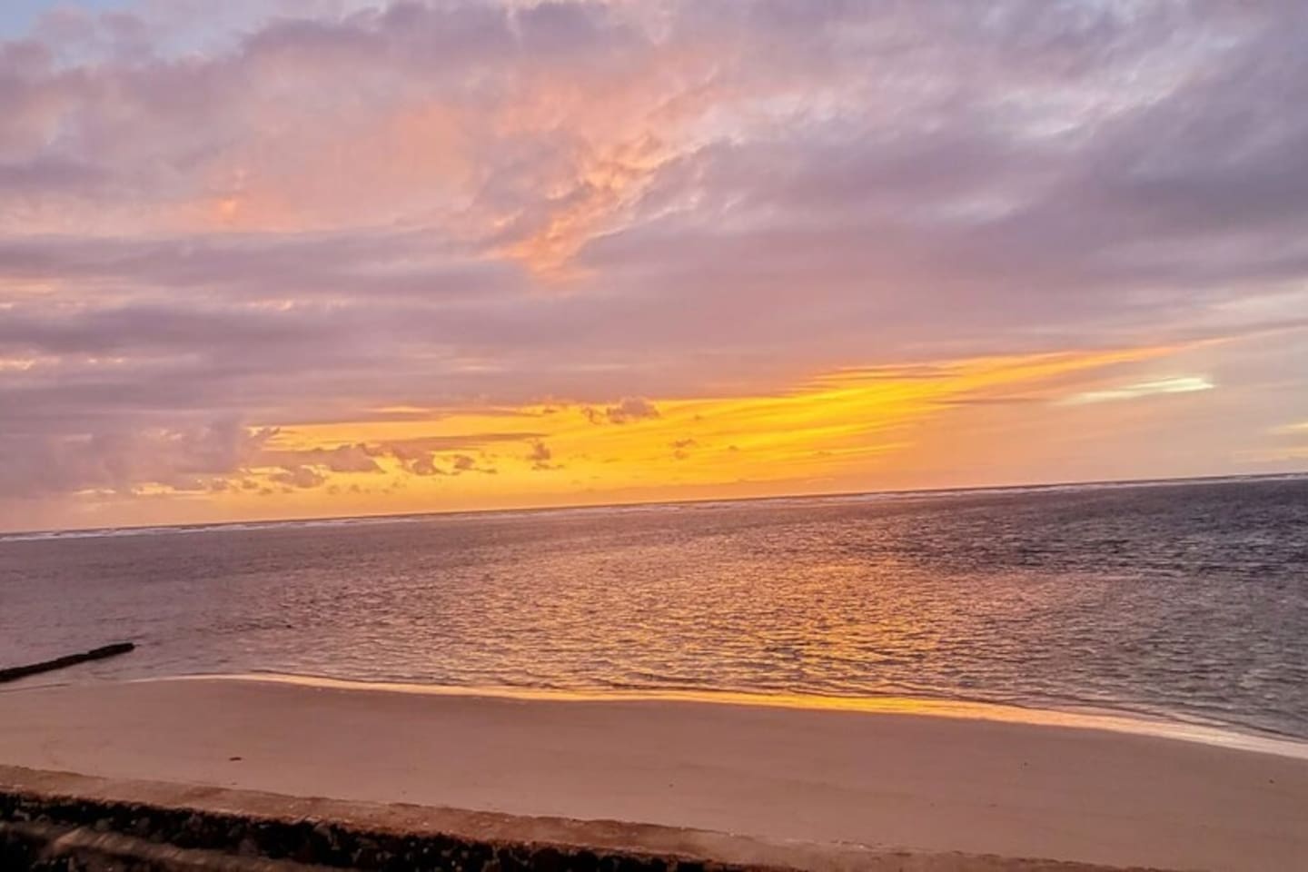 Break of dawn ethereal sunrise at home's very own private beach