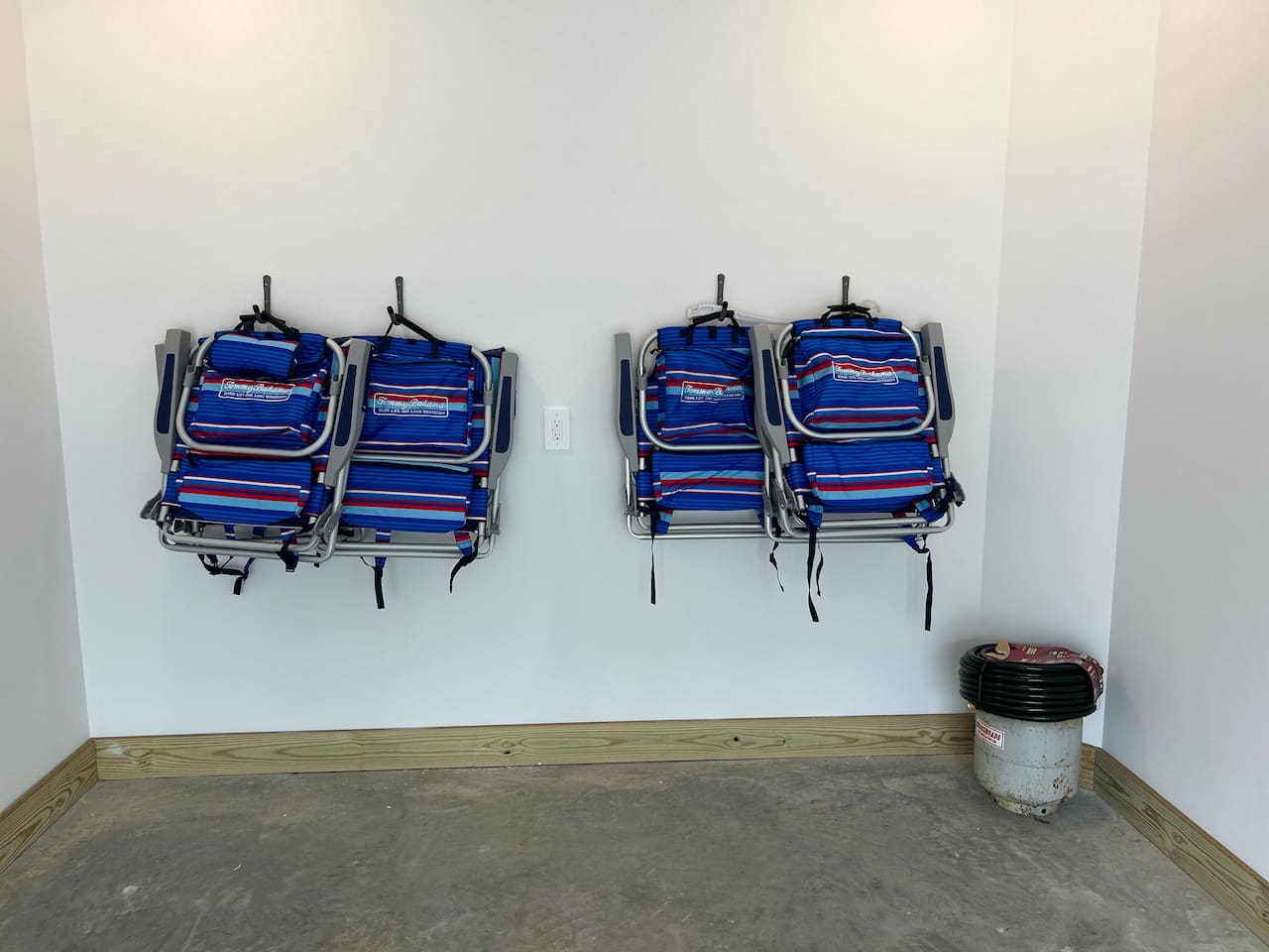 Six Tommy Bahama beach chairs (chairs each have a small cooler and zippered pouch)