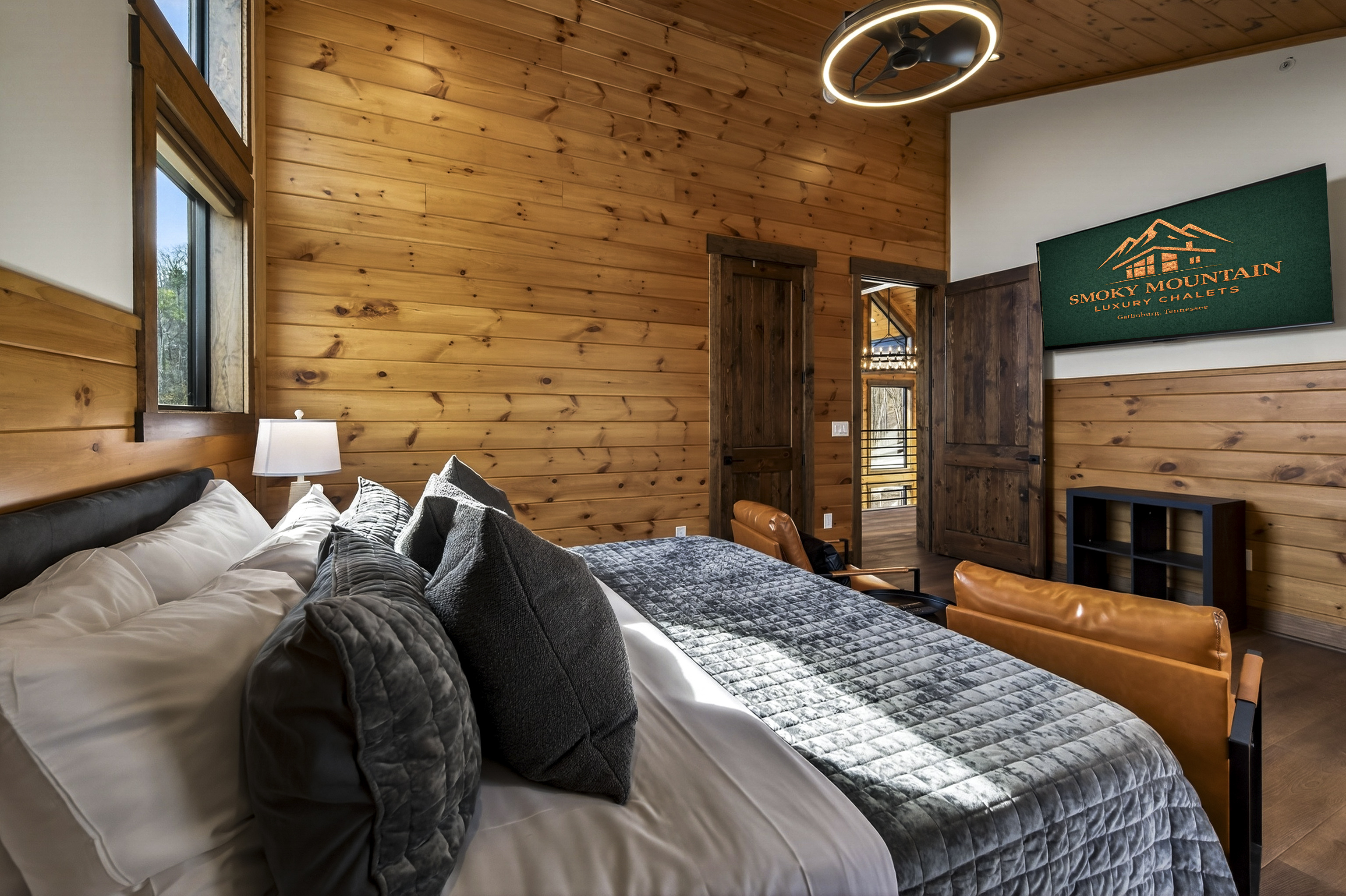 Private King Suite Retreat- on its own private wing of the home, this spacious king master bedroom features vaulted ceilings & beautiful Smoky Mountain views. Relax in the en-suite spa bathroom with a XL soaking tub, with the home gym just steps away.