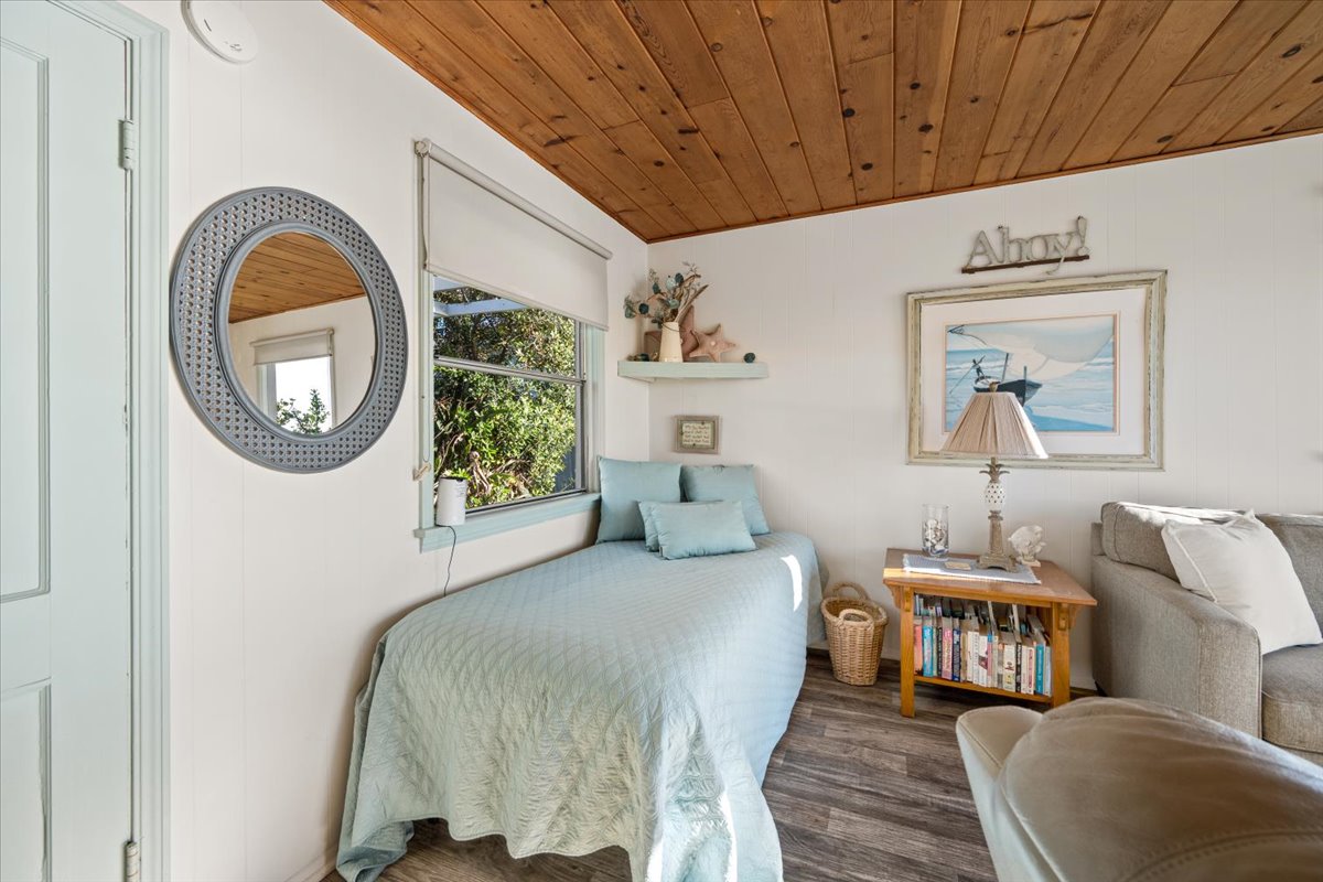 Twin bed in living room 