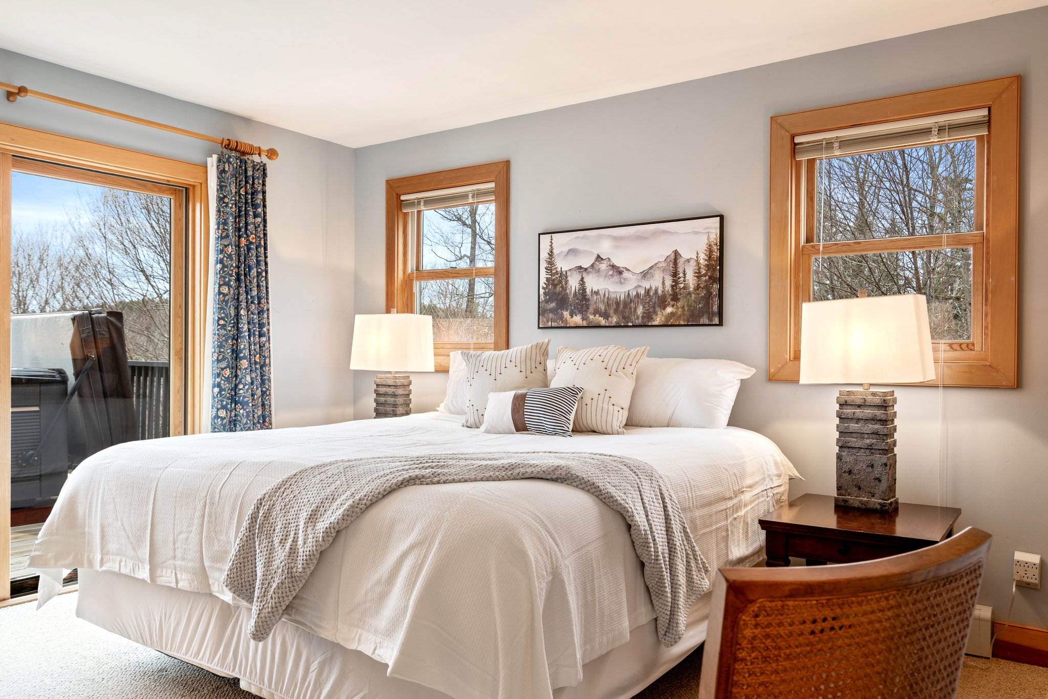 Wake up to soft natural light and peaceful mountain views in a serene bedroom retreat made for deep rest.