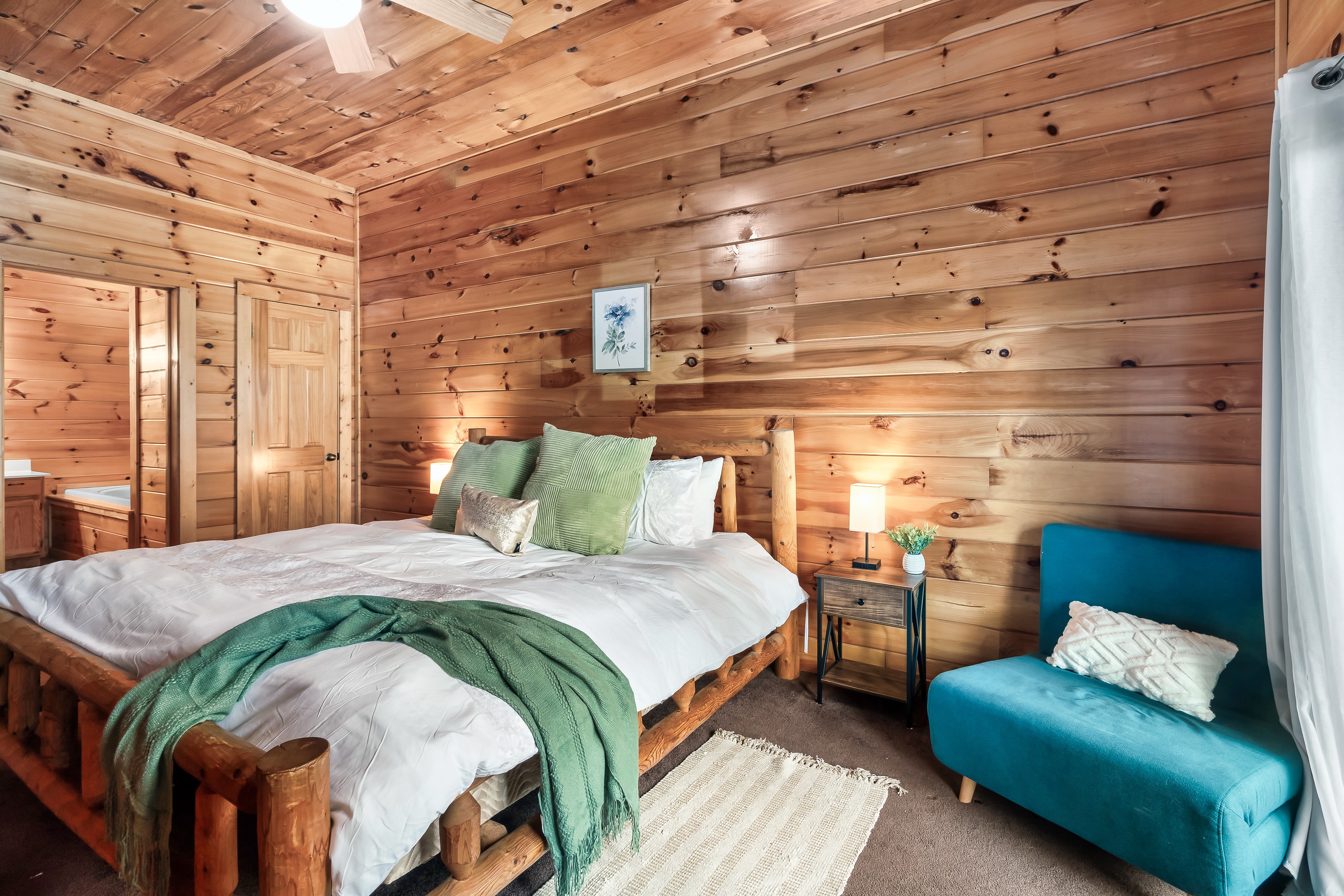 Enjoy peaceful nights in the lower level king suite, offering comfort, privacy, and restful sleep for everyone.