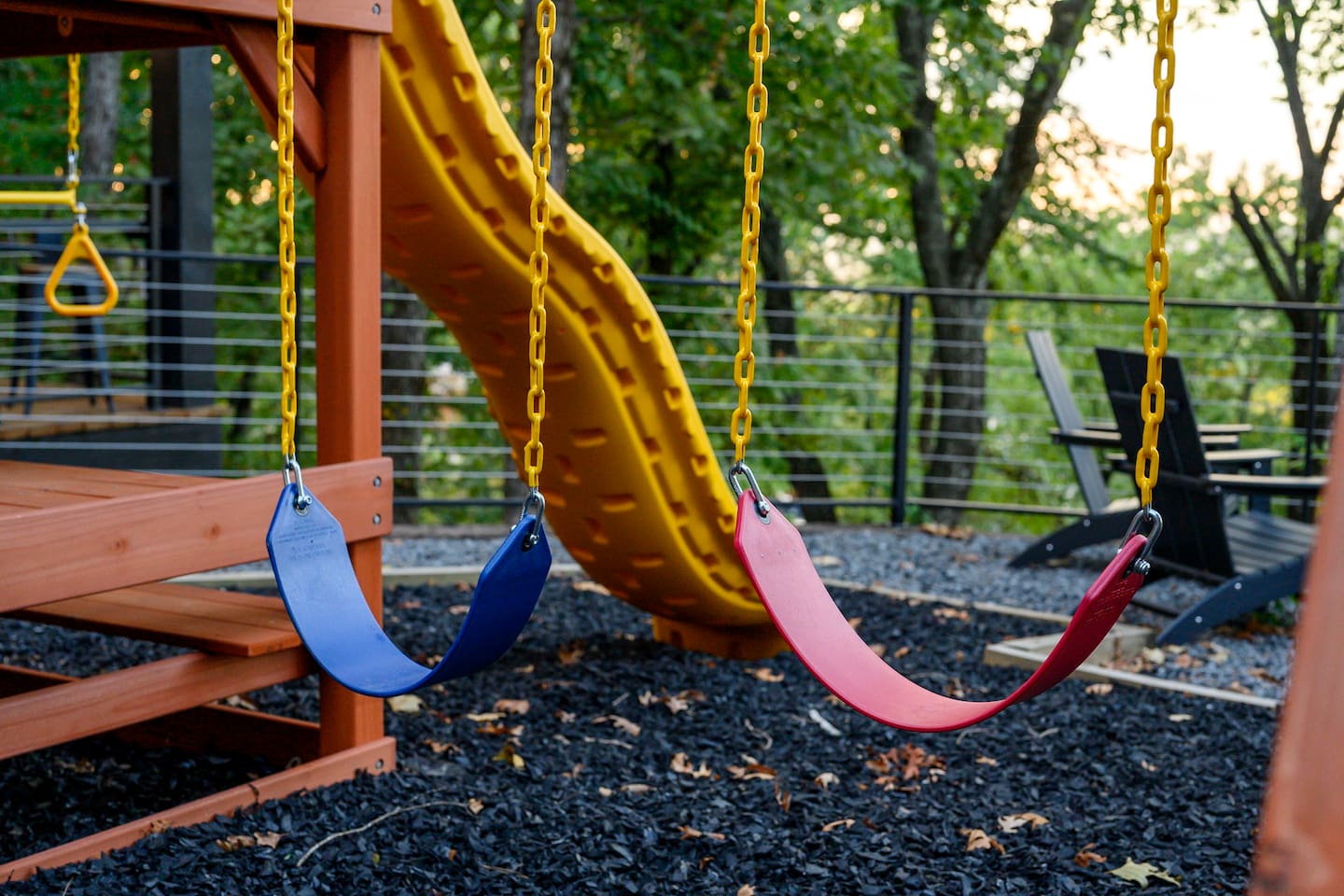 On-site playground with swings and a slide.