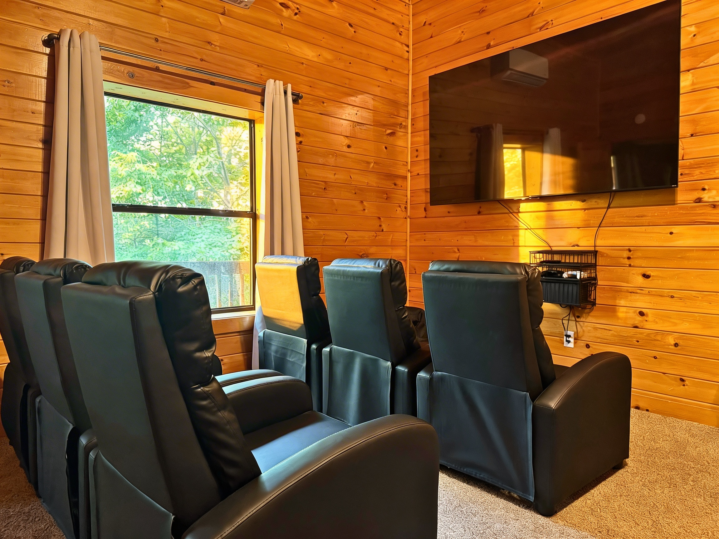 Enjoy movie nights in our cozy theater nook featuring an 85-inch big screen for the ultimate cinematic experience! XBOX too!