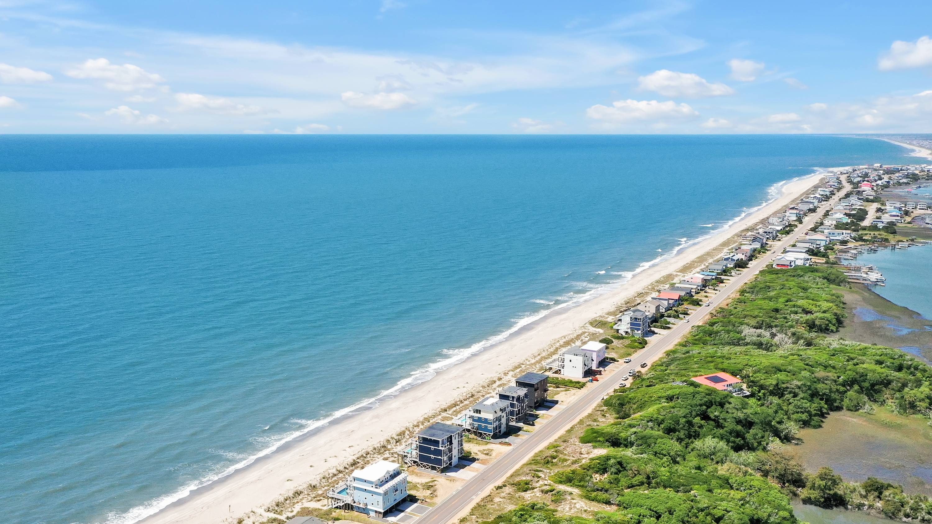 Enjoy Oak Island in an exceptional home and create timeless memories