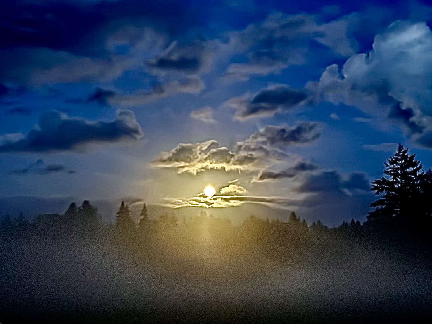 Full moon across from the airport 3 miles away