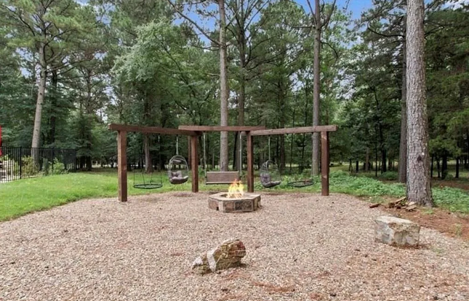 Private outdoor fire pit area designed for memorable nights under the stars