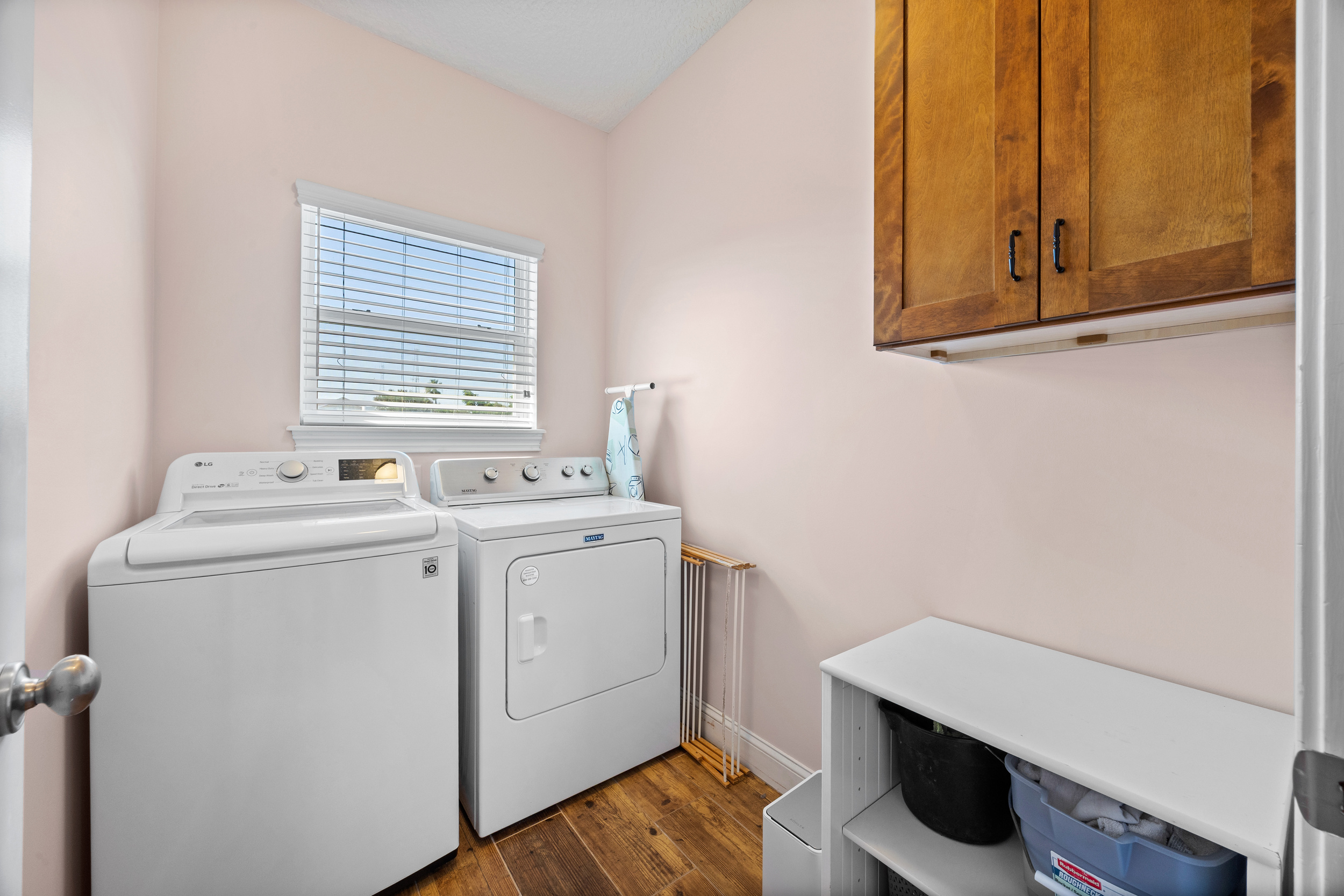A bright and tidy laundry nook to handle all your vacation washing needs.