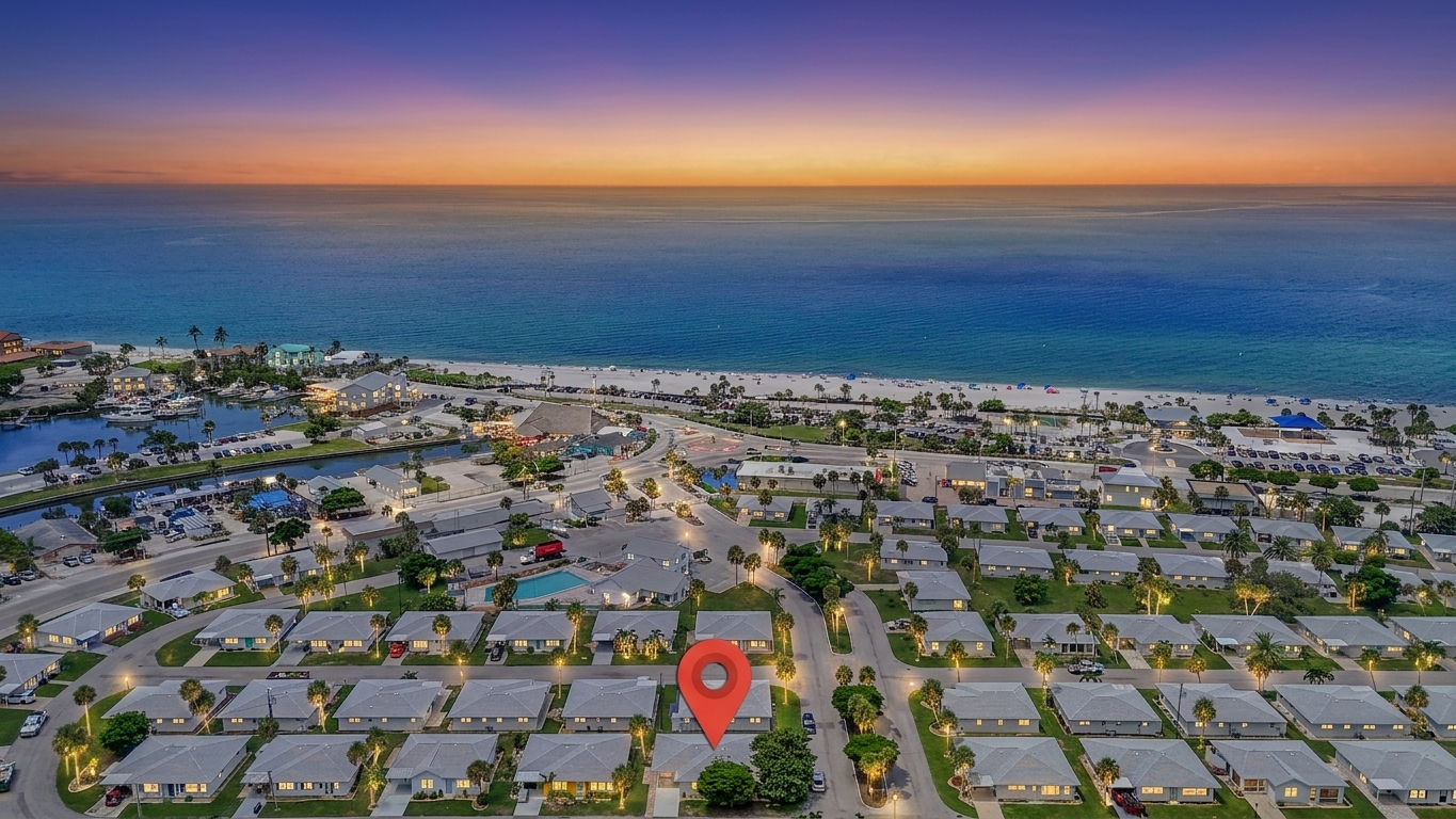 Golden-hour skies reveal the peaceful beauty of Villa 61’s Manasota Key neighborhood.

