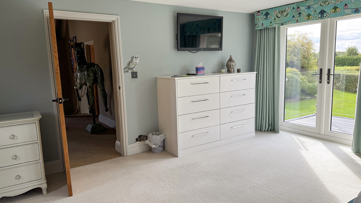 Teal storage and door to horse landing