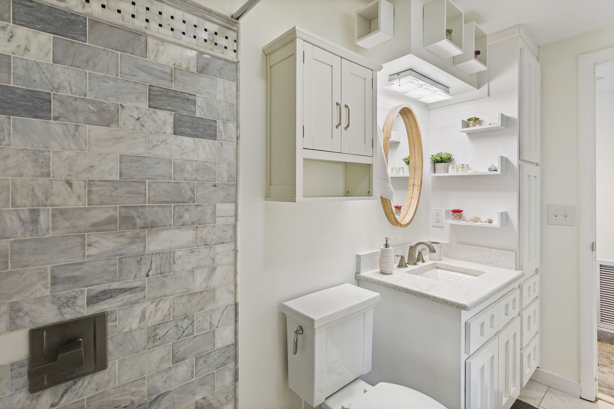 Bathroom: Marble tile shower, granite counter top, and jetted Jacuzzi tub