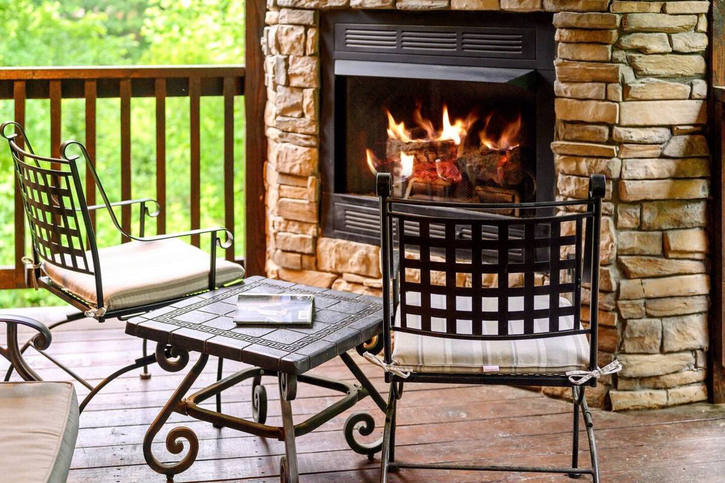 The outdoor fireplace makes for a lovely relaxing spot.