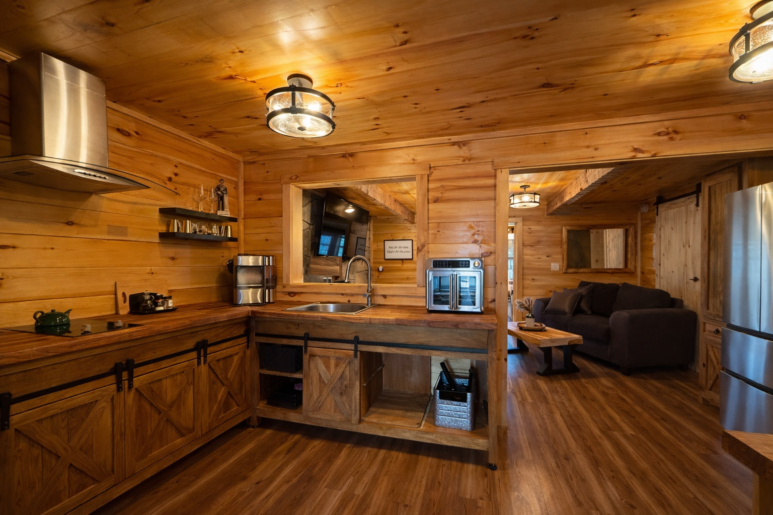 Kitchen w/cooktop, mini oven and pellet ice maker.