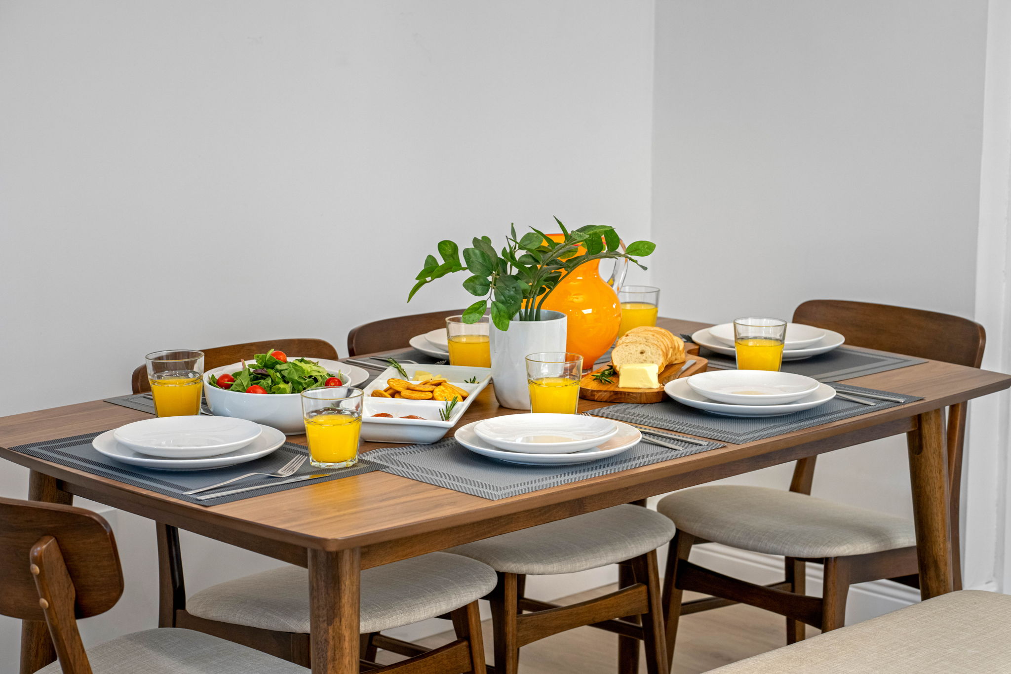 The spacious dining table comfortably seats six—perfect for group dinners, family feasts, or game night.