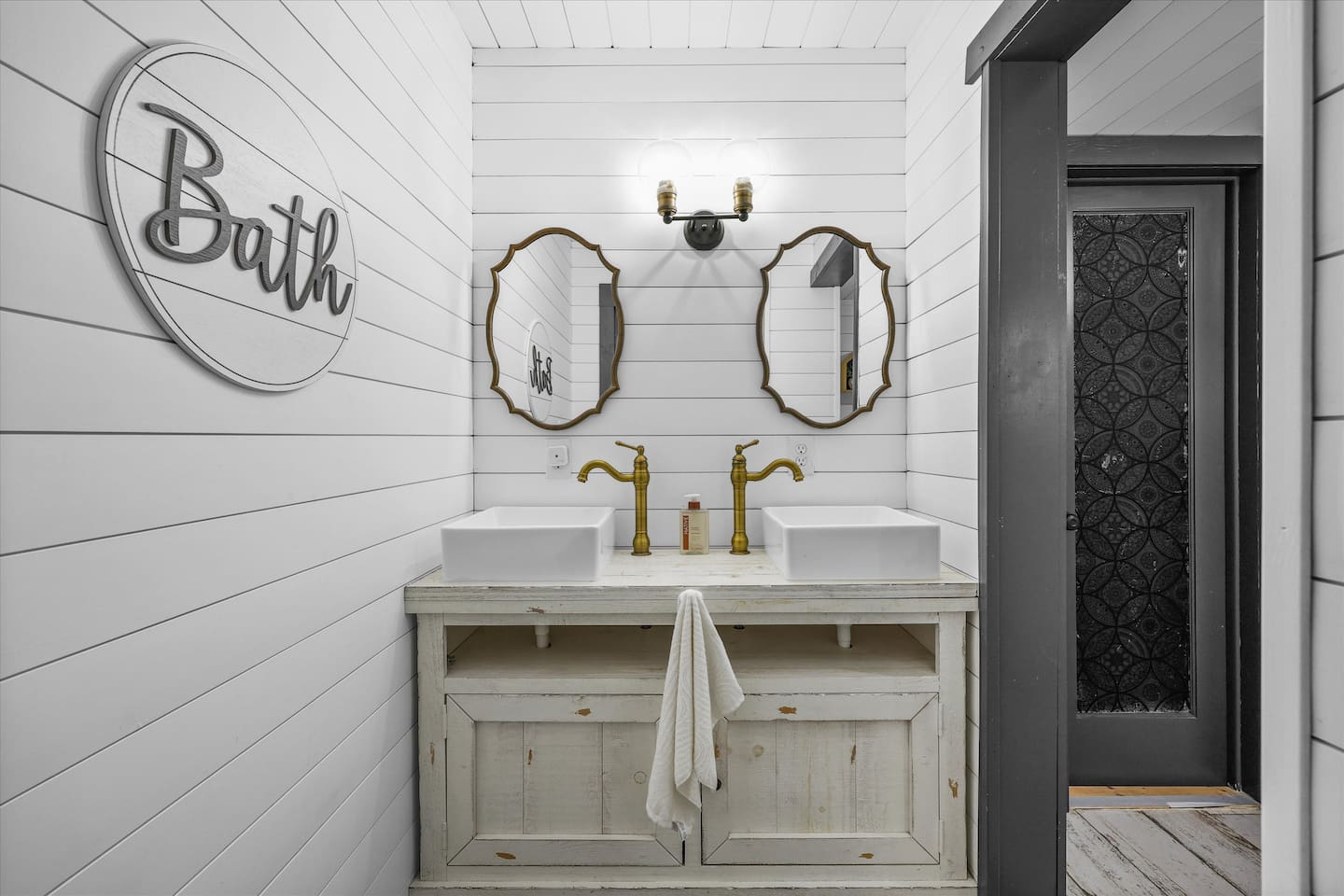 Conveniently located between  (bedroom 2) and (bedroom 3) is a full bath.
