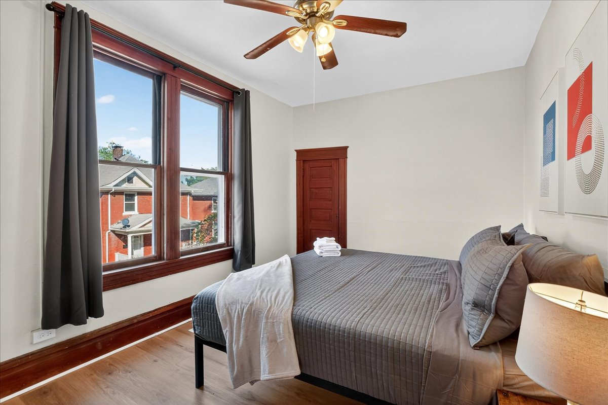 Wake up to sunlight and a lovely view in this king bedroom.