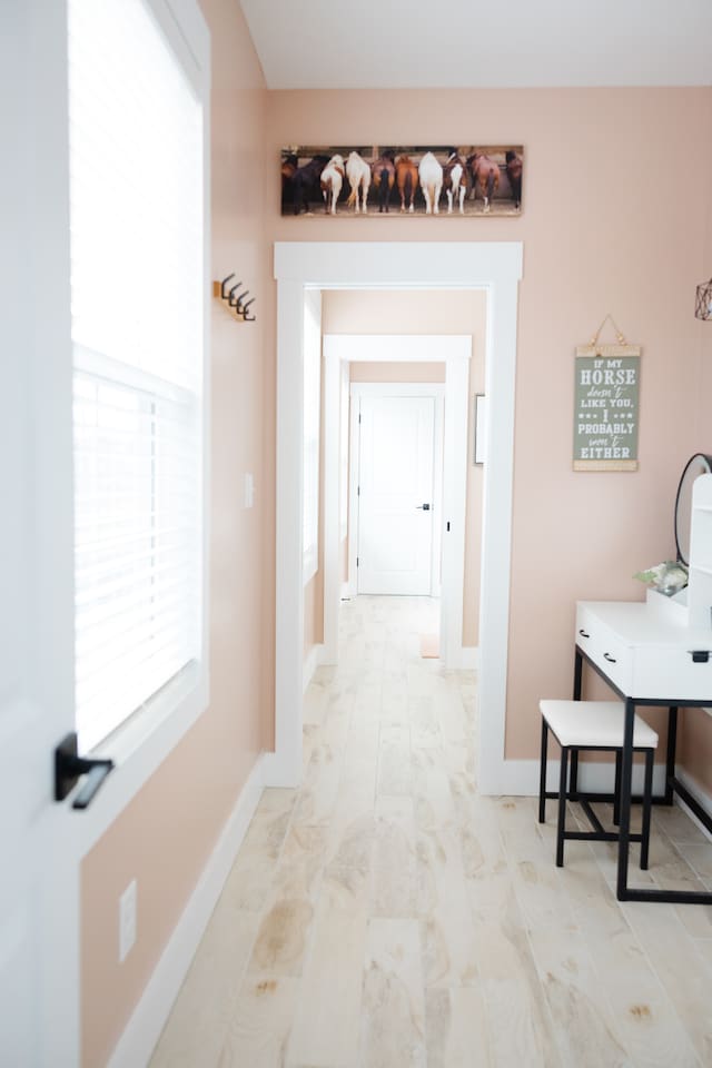 View looking from doorway of bedroom #5 through private sink/vanity area to bedroom #4's private sink/vanity area. Sliding doors for privacy in between with separate toilet and shower rooms. 