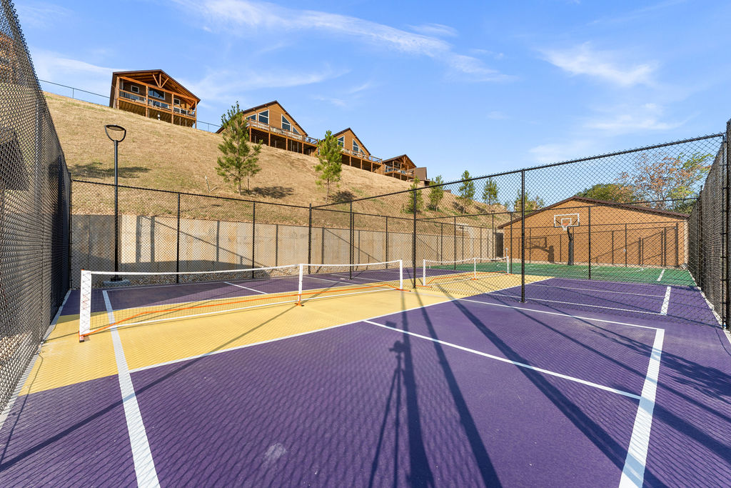 Two pickleball courts and a basketball court
