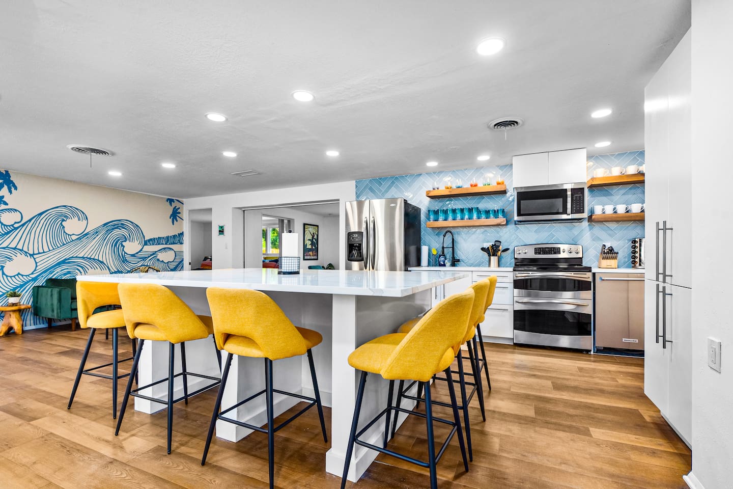 Newly remodeled kitchen with full slab quartz countertop, seating for 8. 