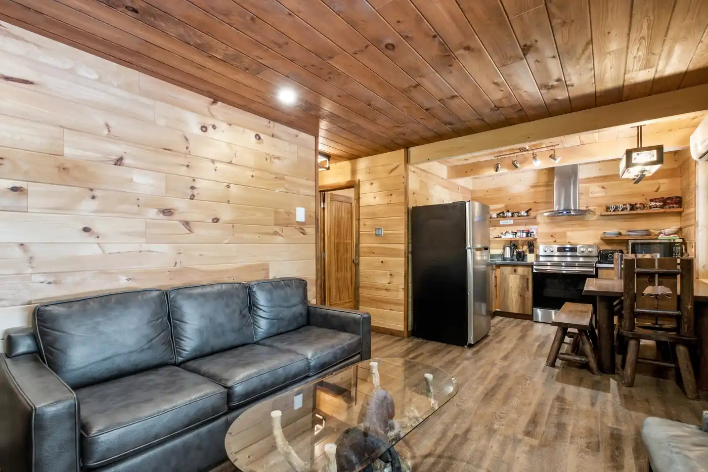 Living room and kitchen with warm wood finishes