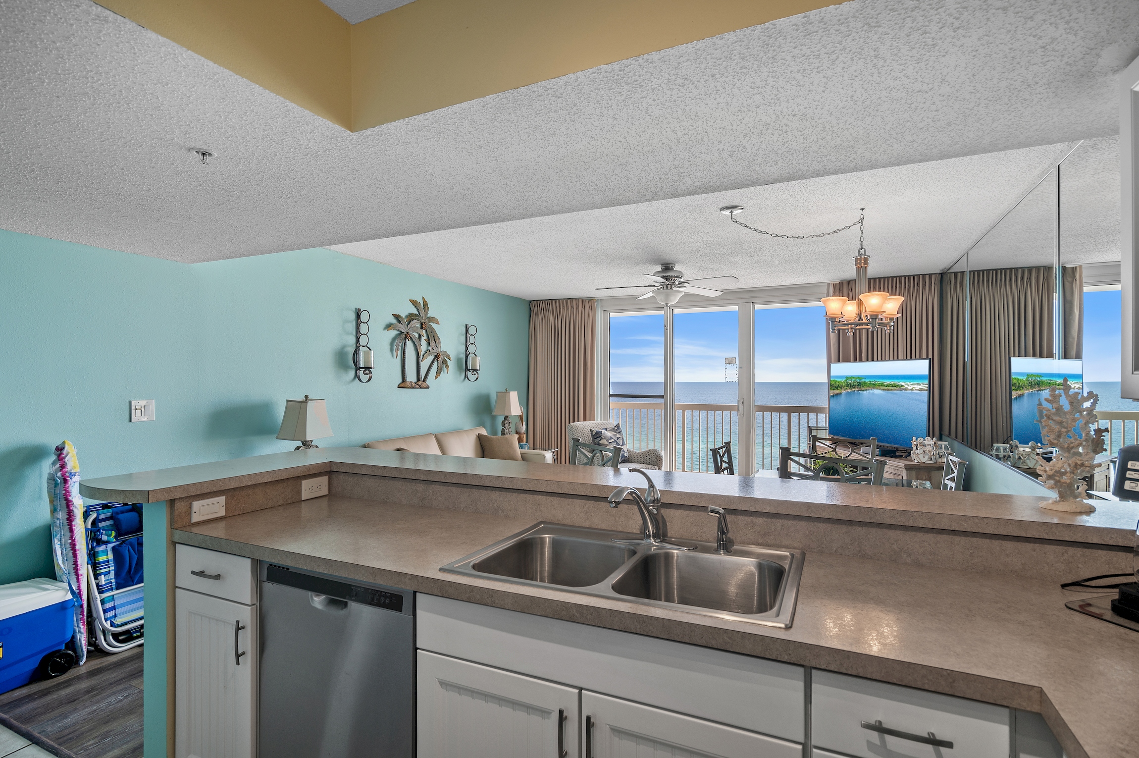 We confess, you still see the beach when you are cooking in our unit 1006 Pelican Beach Resort Destin FL