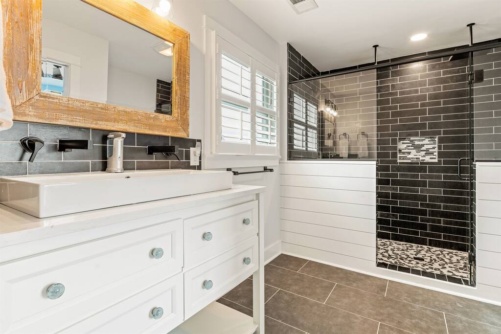3rd floor Master bathroom, shower with 2 rain shower heads and benches