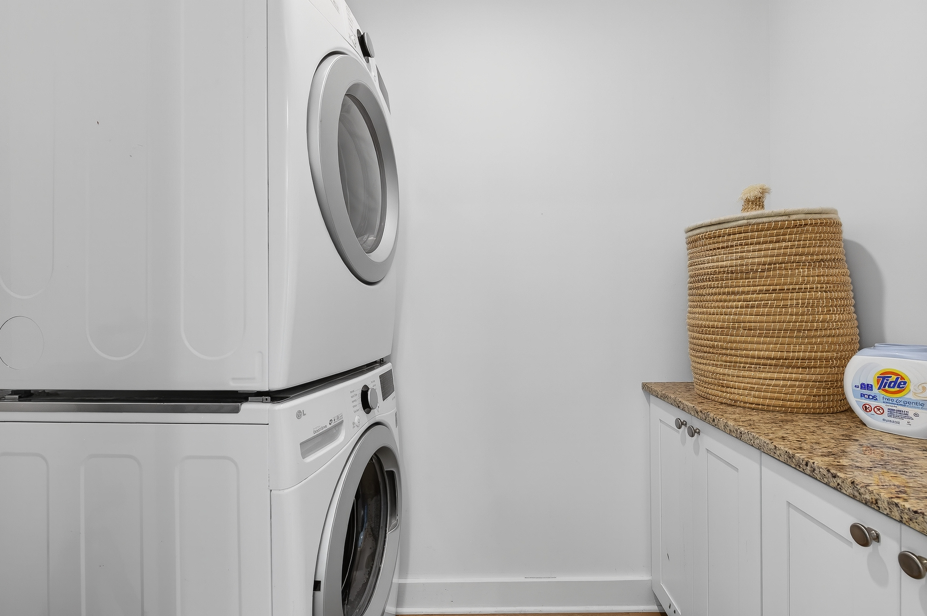 Full laundry room with washer & dryer for easy, extended stays