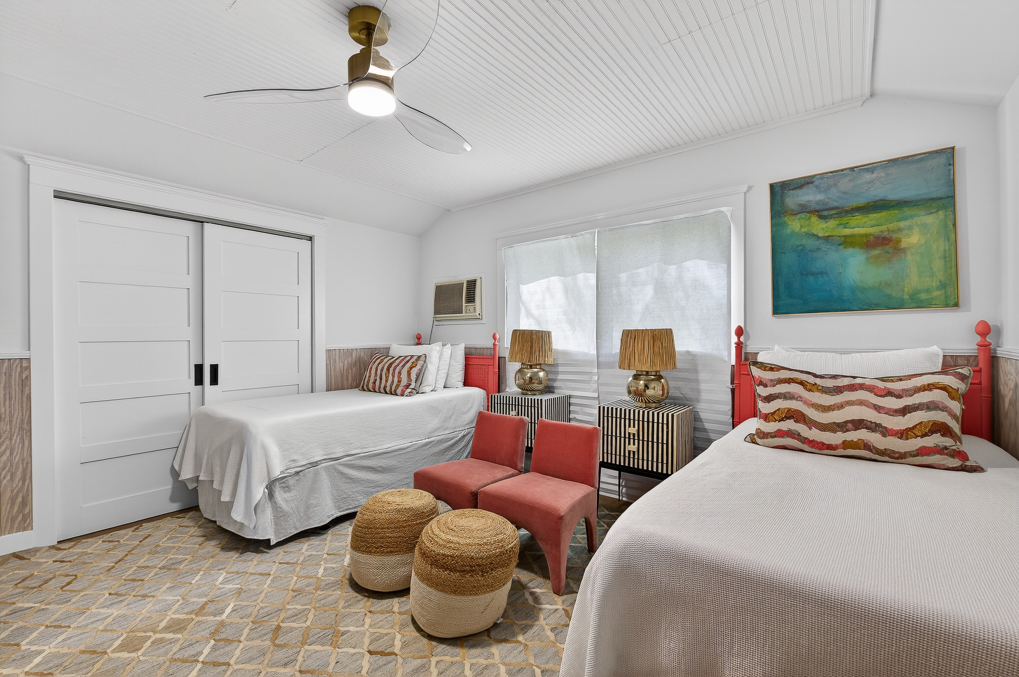 Roomy twin bedroom with coastal vibes