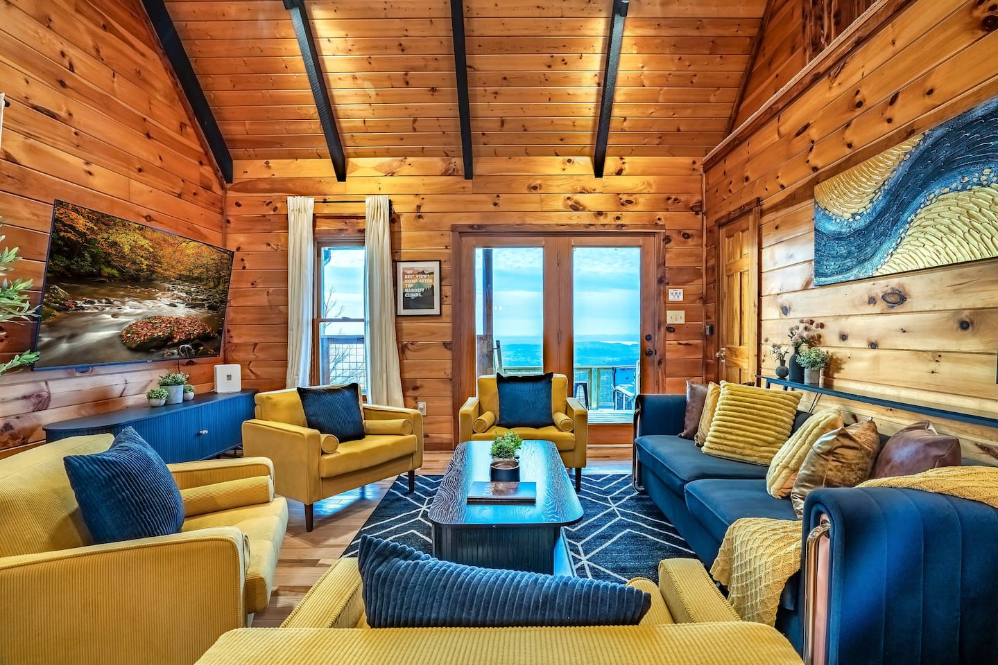 Step in and unwind in a comfortable, modern and cozy living room overlooking mountain views and glowing Smoky Mountain sunsets.