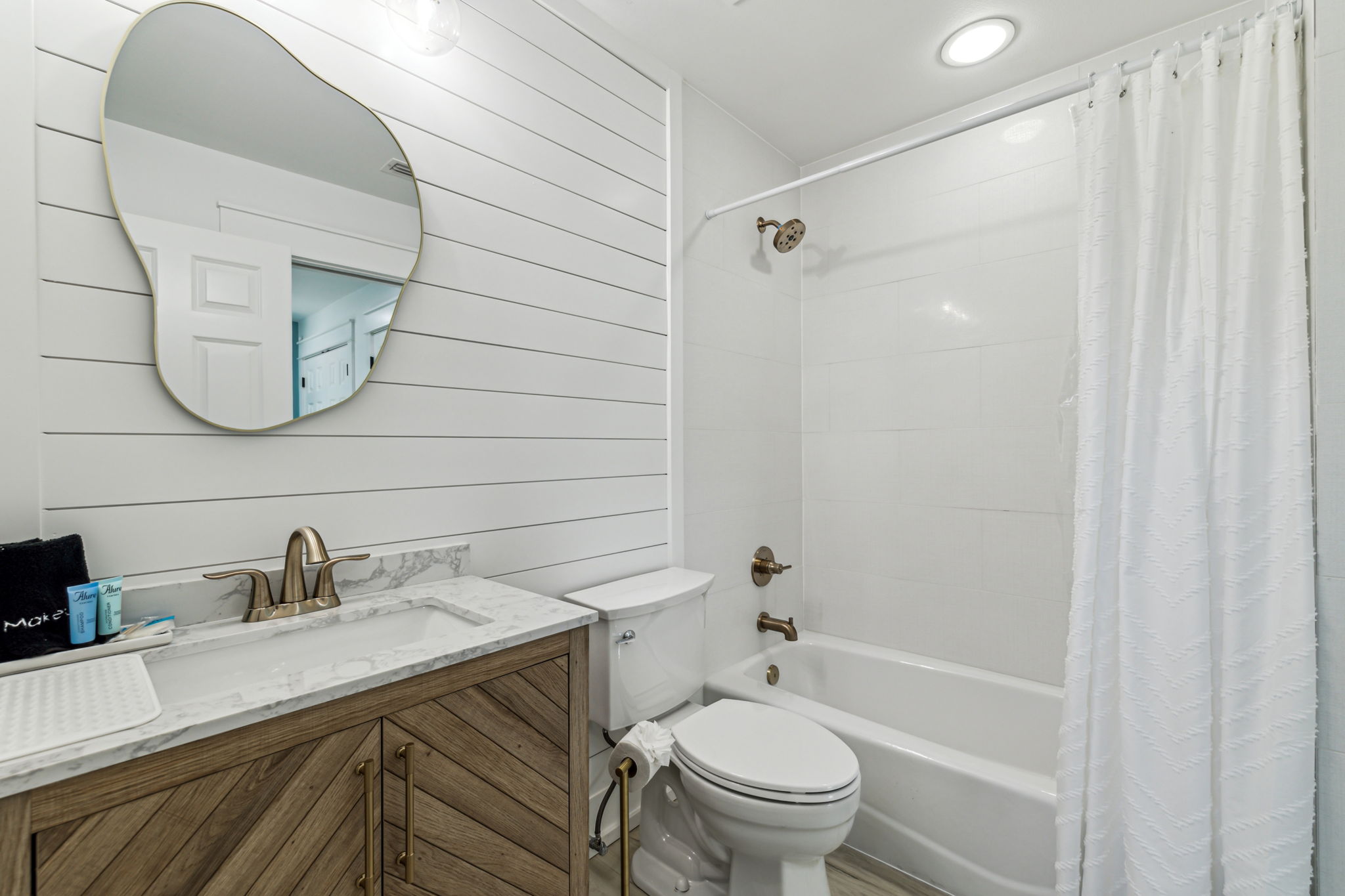 3rd Floor-Bathroom 4-(This BR has 2 doors!  One leads to single bunkbed room and the other leads to the 3rd-level hallway) Amenities: travel-size shampoo & conditioner, sm bar of hand soap, cotton swabs, 2 makeup removal towels, hair dryer, & hot tool mat.