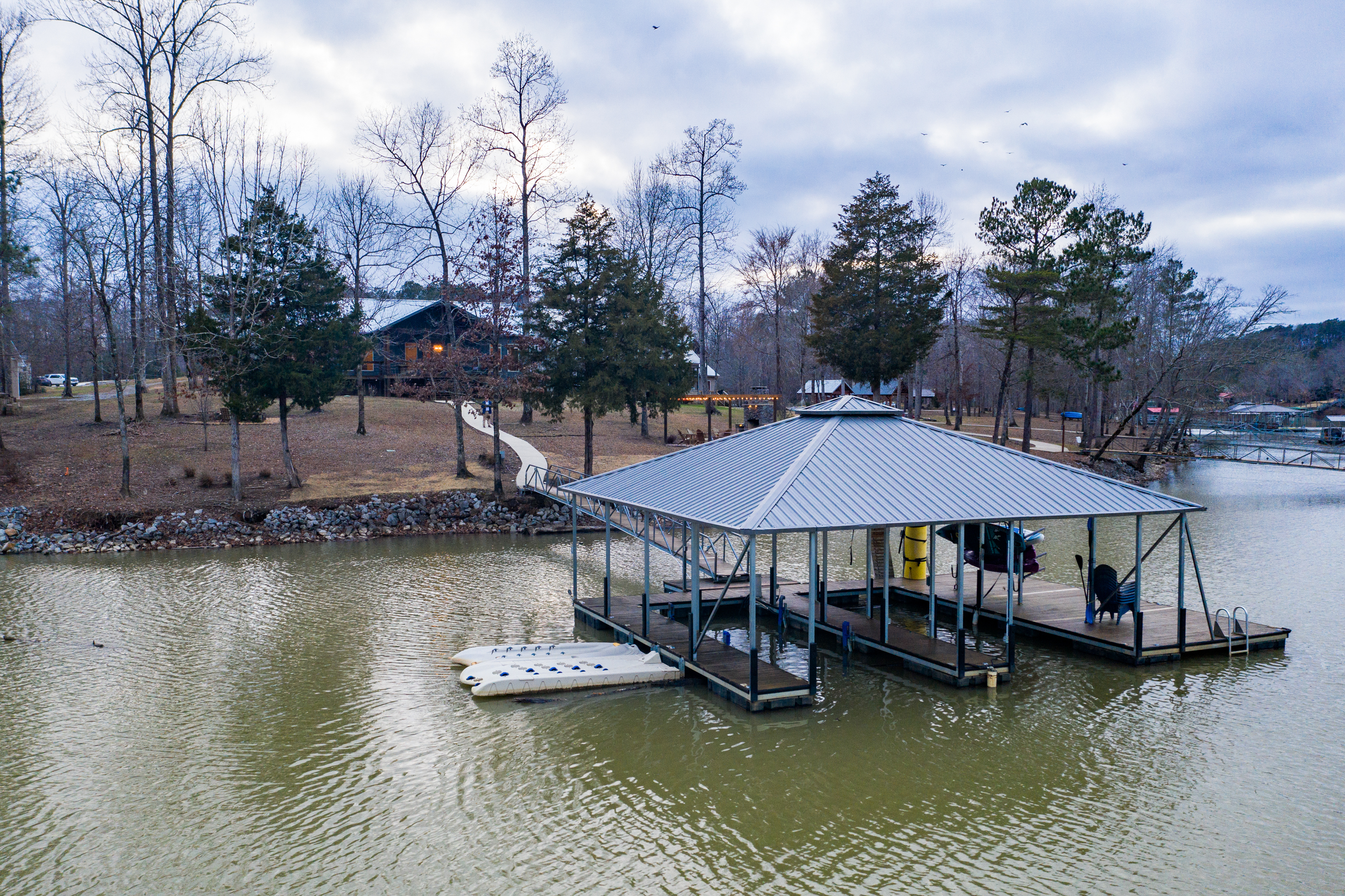 Backyard looking towards home and back patio and private dock