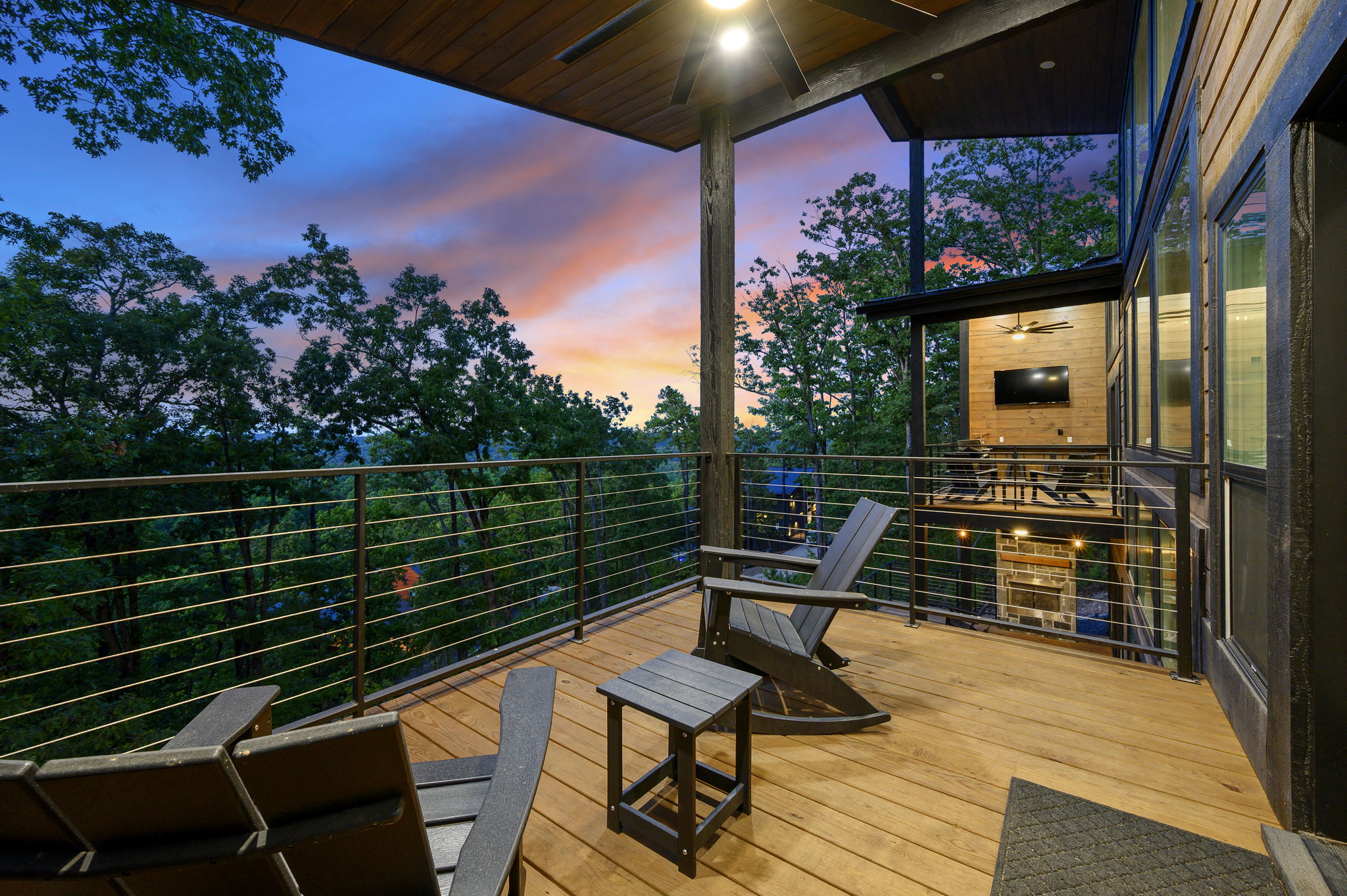 Private upper-level deck off Bedroom 1, offering a peaceful spot for morning coffee and beautiful mountain views.