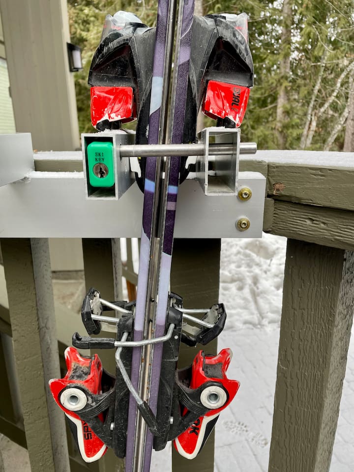 Commercial grade lockable SKI & Snowboard Racks right outside your front door on the private deck.  
These are the same SKI-KEY racks Vail uses on Whistler & Blackcomb. Narrow rack is for skis & wider rack is for snowboards or extra wide skis.  