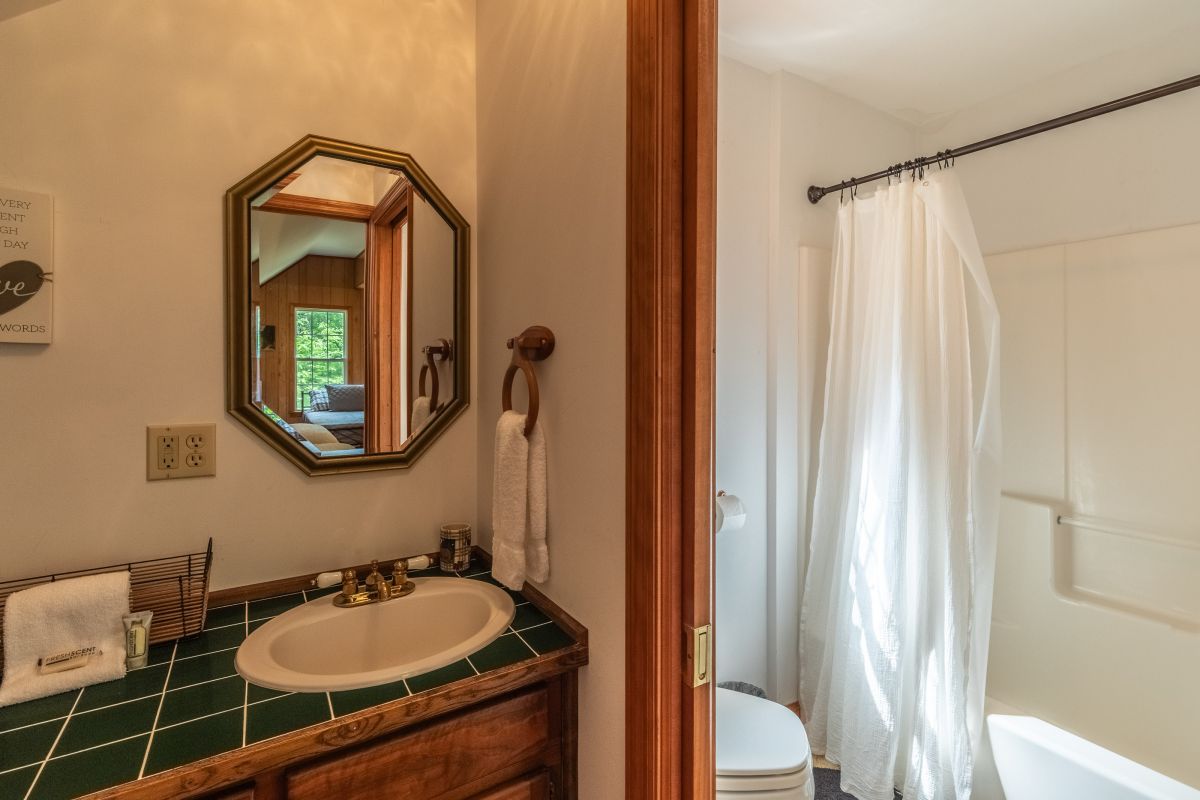 Bathroom Retreat: Bright space with elegant fixtures, perfect for refreshing moments after adventures!

