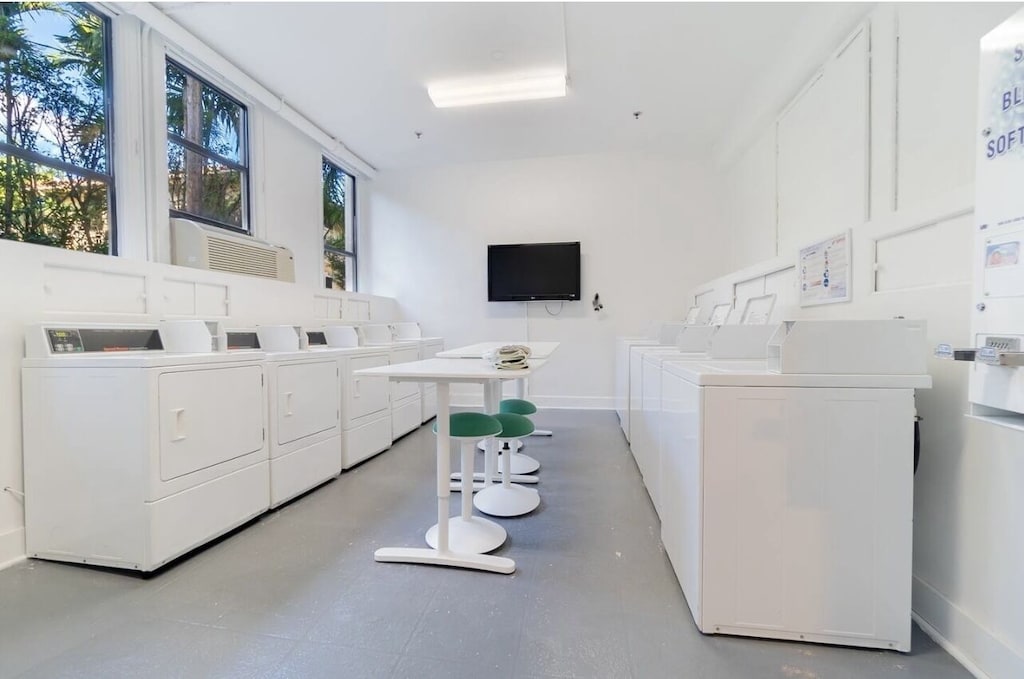 Bright sunny laundry room for Palm Beach Hotel guests off the main level. All new cc operated washer/dryers.