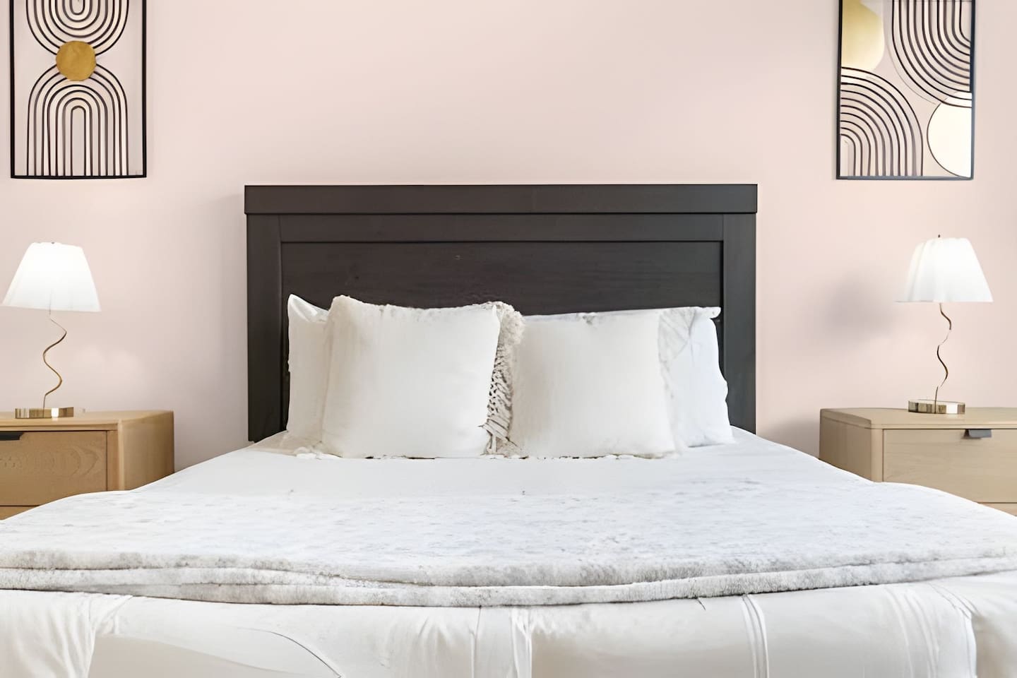 Serene bedroom with plenty of natural light.