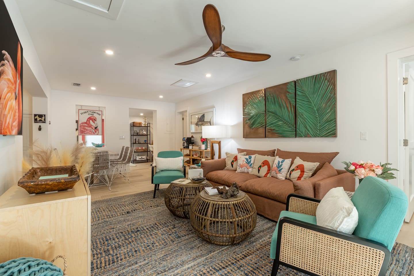 Living Room: Vibrant decor meets island vibes in this sunlit, stylish retreat!