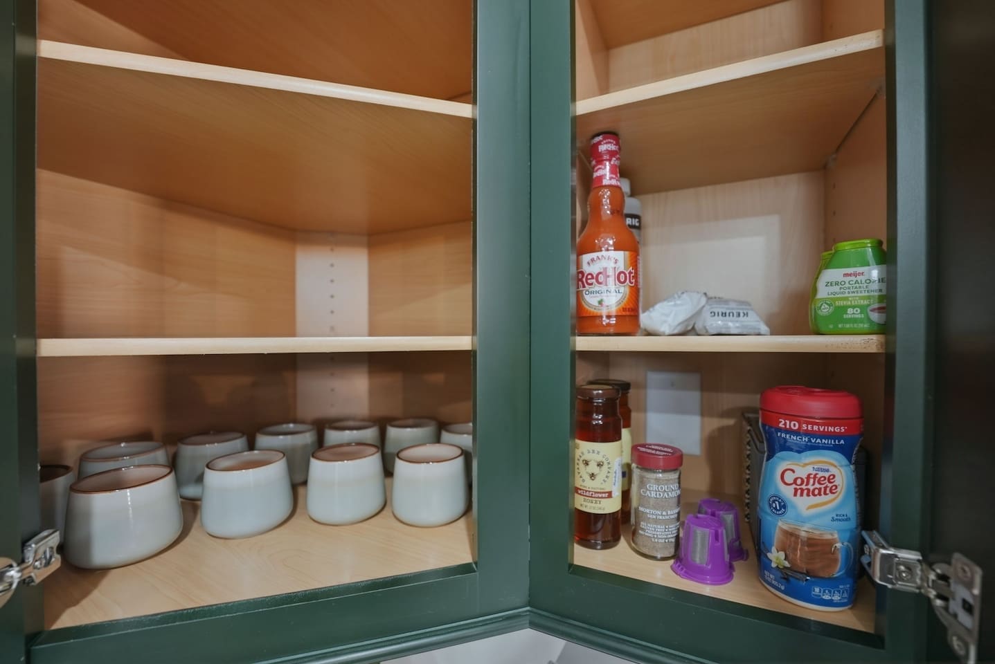 Kitchen pantry space with everyday essentials like salt, flour, and cooking ingredients for added convenience during your stay.
