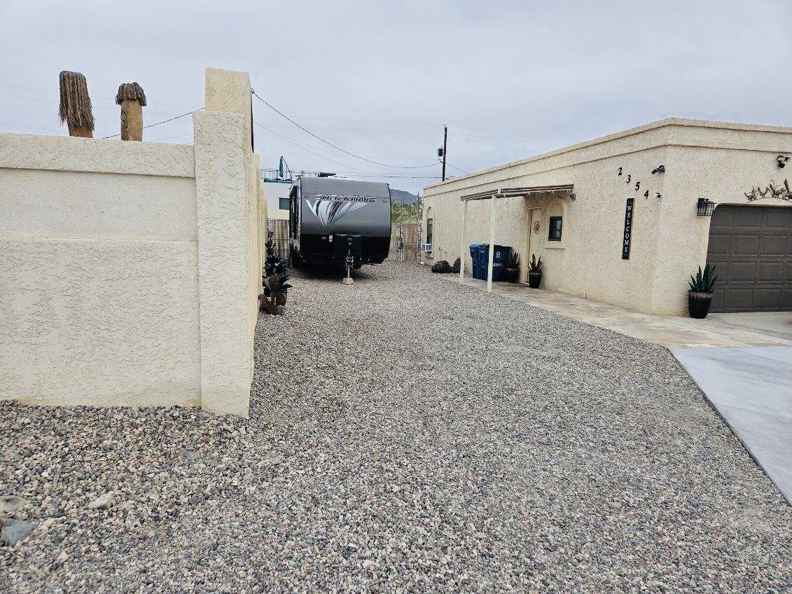 Side entrance and parking