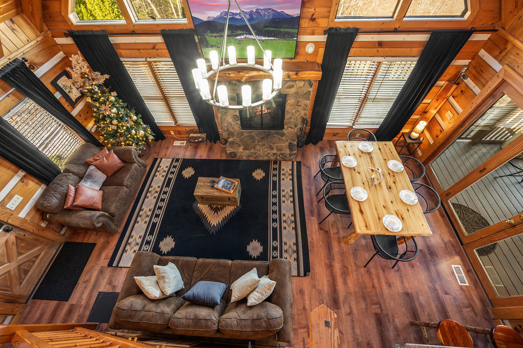 Main living room with wood-burning fireplace