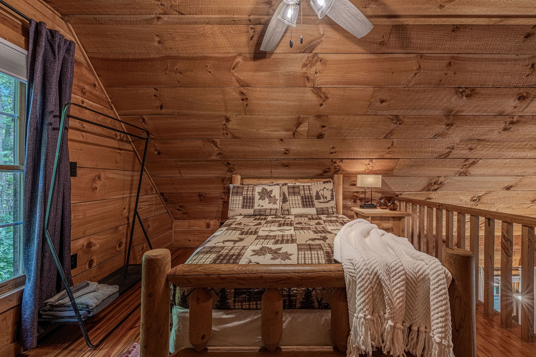 Tucked up in the loft with wood all around you.