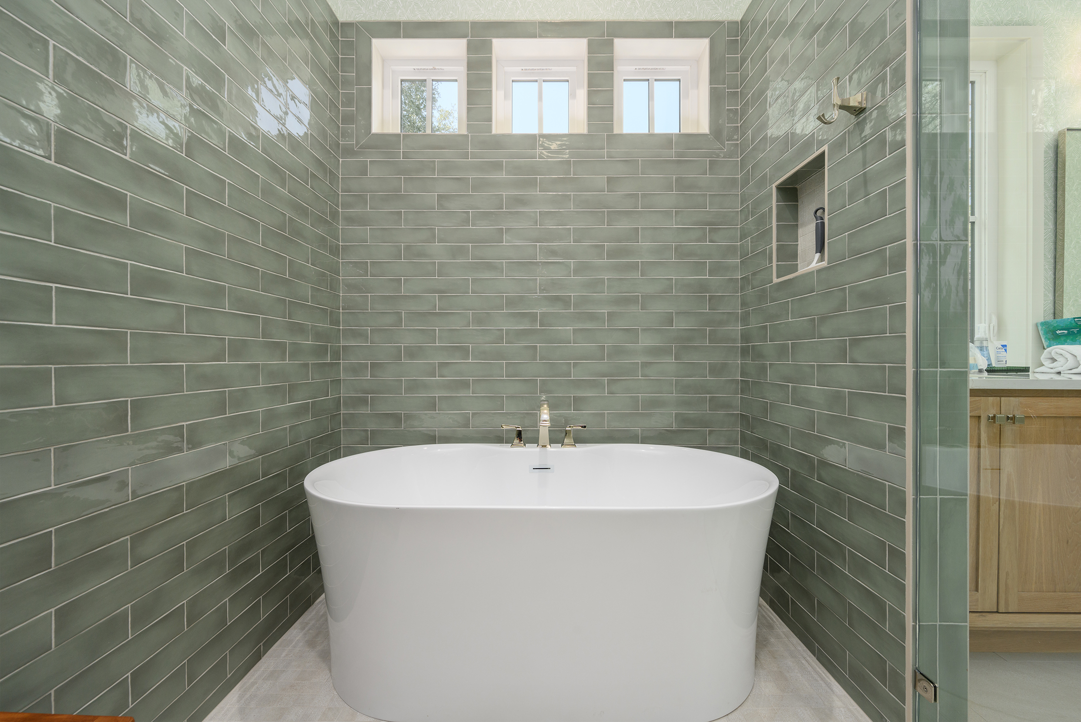 Master bath features a deep soaking tub