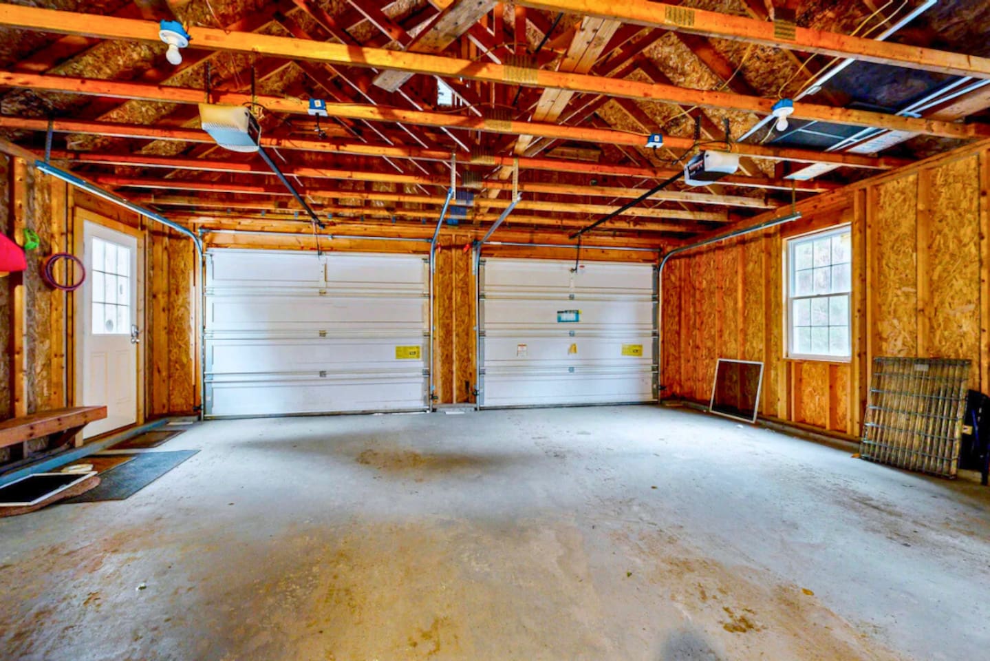 Big garage for 2 cars to park in and store all your gear! 