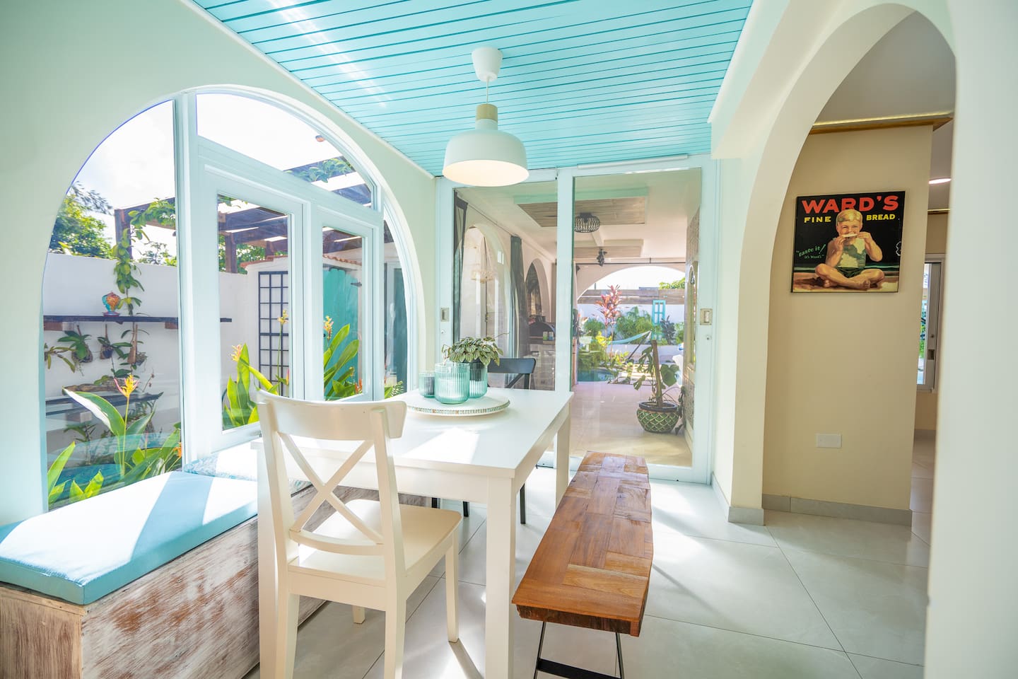 The breakfast nook. While you sit and enjoy your breakfast, make sure you look out the window, often hummingbirds and finches are feeding on the birds of paradise.
