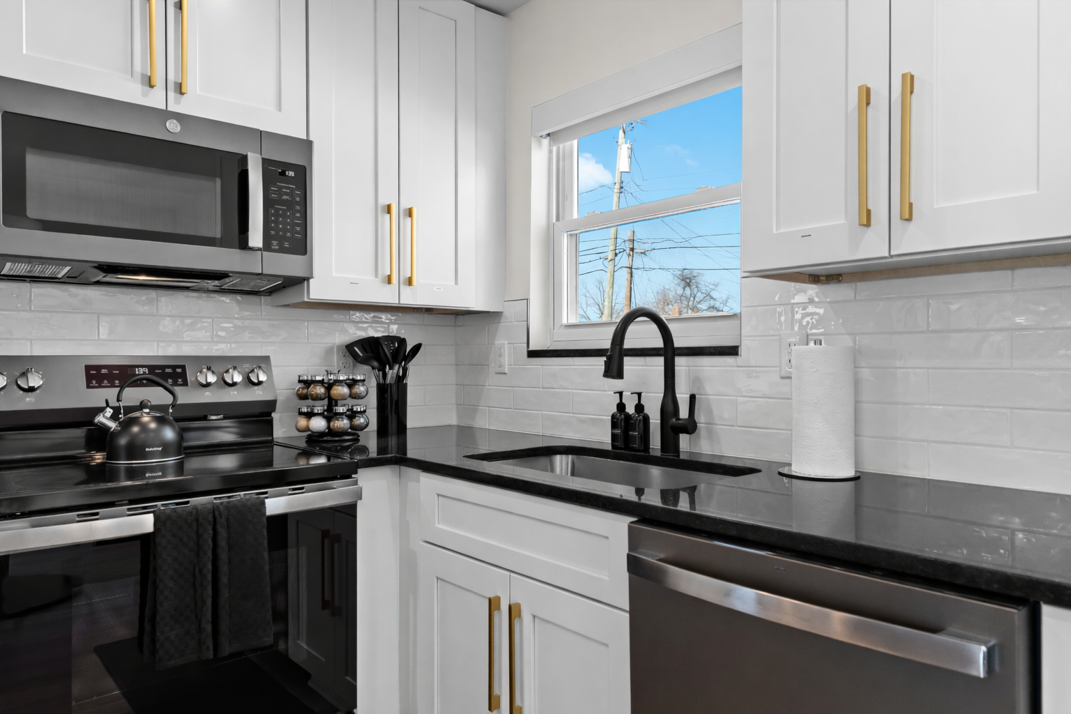 Modern kitchen details with sleek countertops, updated appliances, and bright natural light—clean, functional, and designed for easy, enjoyable cooking.