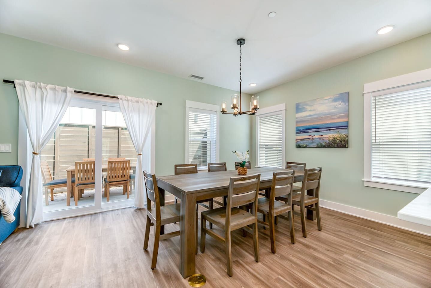 Enjoy family meals together in the bright dining space just steps from the private outdoor patio.