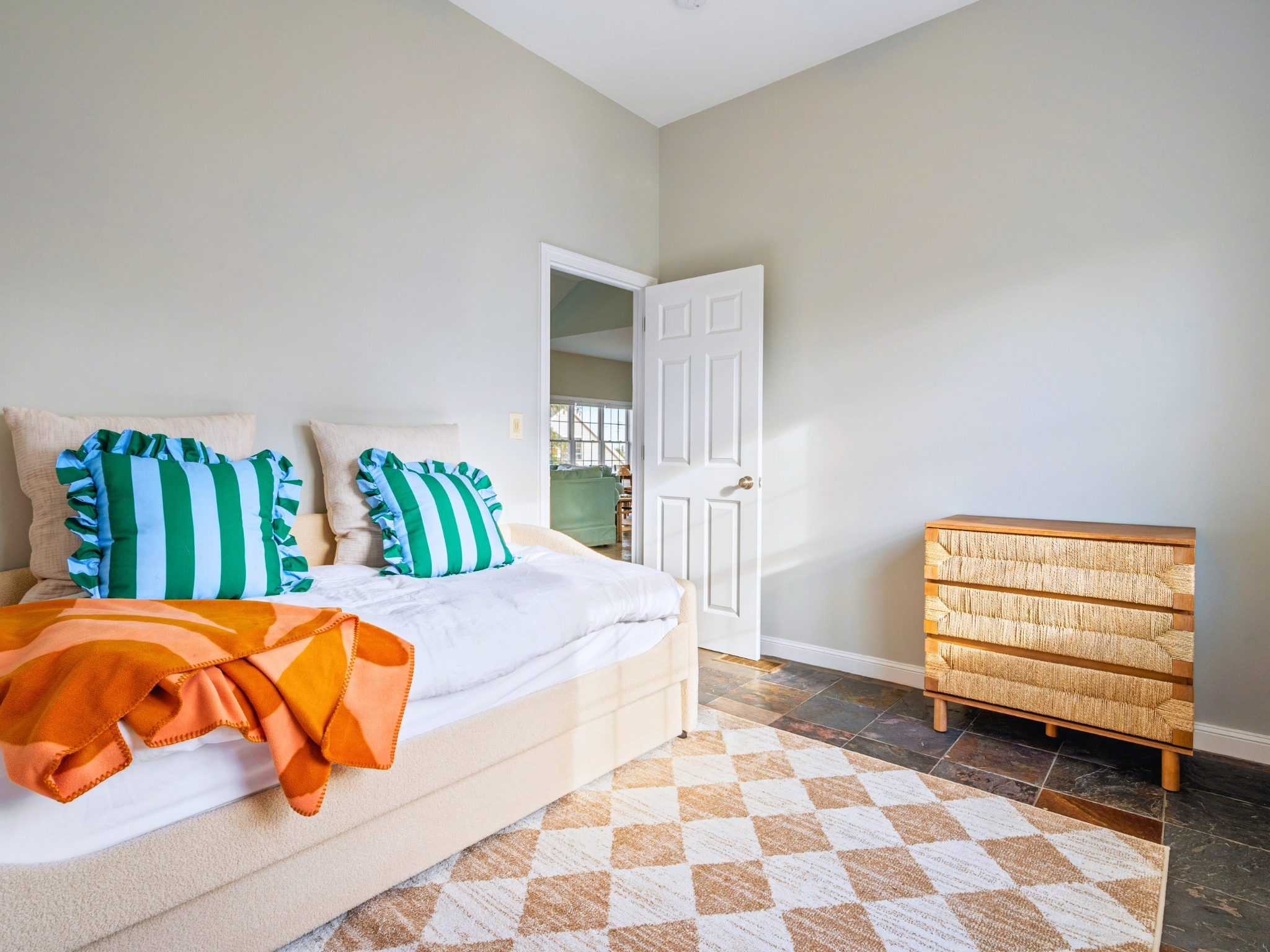 Our second bedroom on the main floor features a cozy sleeper sofa, perfect for extra comfort and convenience!